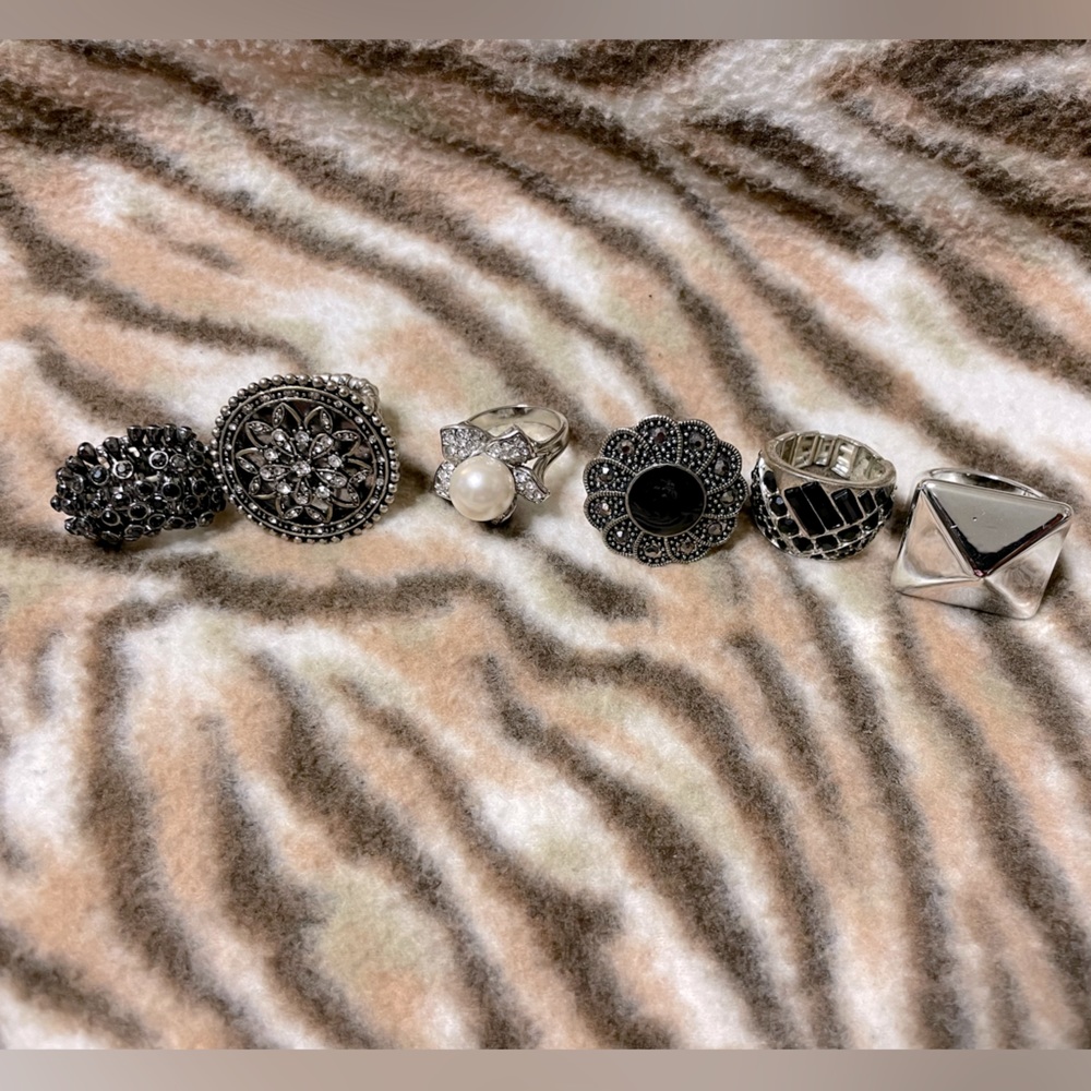 Six Silvertone rings